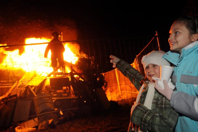 Children enjoyed bonfire night at Millennium gardens in MWH arranged by Mansfield CVC. Pictured - Jennifer Corner and Kerry Barksby. Year: 2010







.