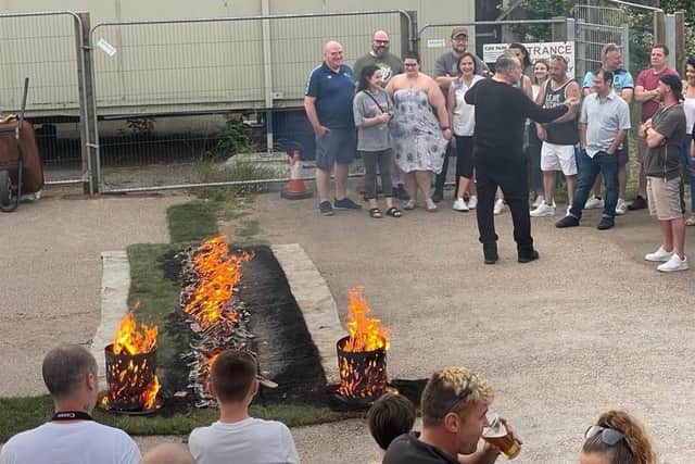 Participants were given an inspiring pep talk as the flames heated up the coals ever more