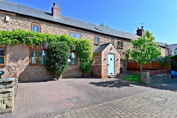 The delightful frontage of a five-bedroom terraced cottage at Mill Yard, Hucknall, which is on the market for £360,000 with Mansfield estate agents Need 2 View.
