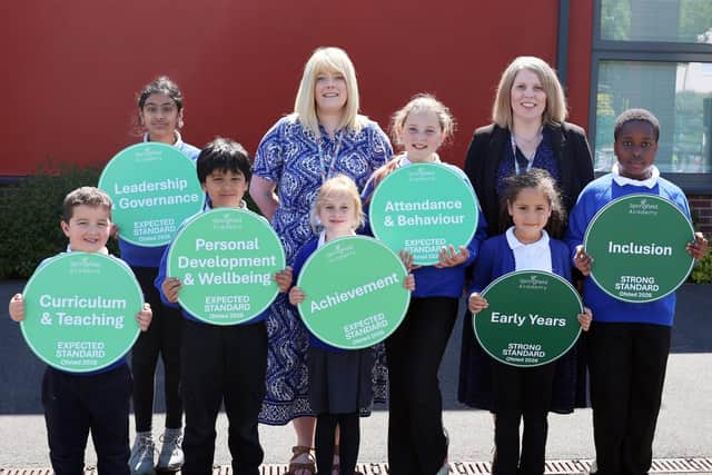 Springfield Academy pupils and staff, including Jackie Hill, headteacher (right) and Louise Ogle, deputy headteacher (left), celebrate a new Ofsted report.