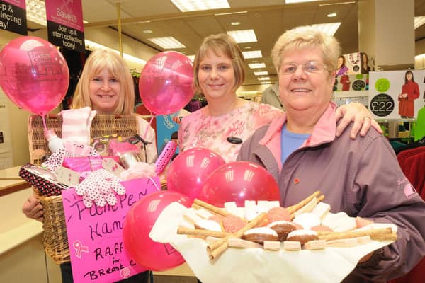 2009: Glenis Sears, Gaynor Radford and Sue Astill at the Hucknall Bon Marche shop's Wear Something Pink Day.