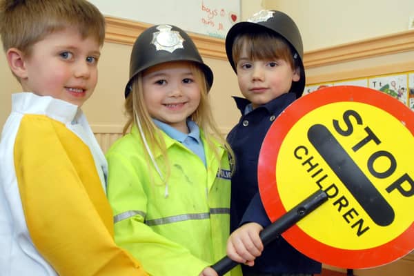 2010: Children at Watnall Road Pre-school play group in Hucknall take part in a road safety day. They are (from left) Joel Daft, Serenna Smith and James Ball.