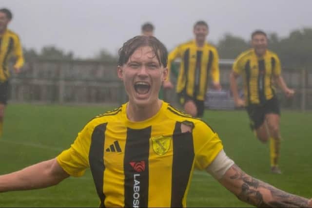Two-goal hero Taylor Jaine celebrates one of his strikes against Belper. Photo: Hucknallram Photography