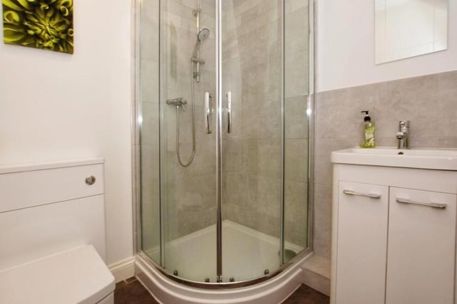 As well as the main family bathroom upstairs, the Papplewick Lane home houses this shower room on the ground floor. It consists of a single shower enclosure, vanity wash basin and WC.