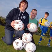 Hucknall's Rolls Royce junior football teams prepare for a marathon football event in aid of Clic Sargent in 2011. Pictured from the left are; Jo Hobbs, Under 9's Secretary, Mark Thorley U13's Assistant Manager and players Joshua Hobbs 9, Owen Hall 9 and 13 year old Tom Thorley.
