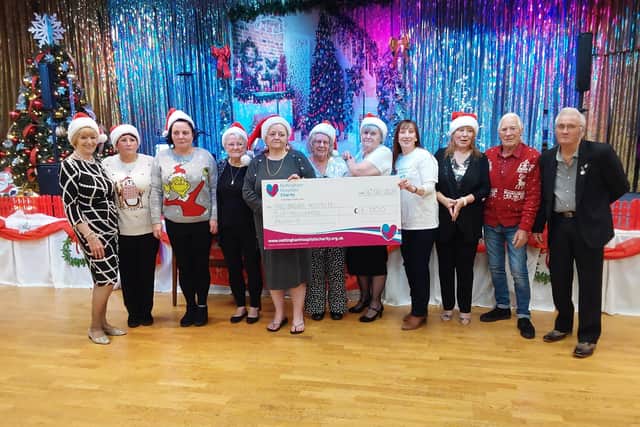 The Bulwell 'Calender Girls' present the cheque to Nottingham Hospitals Charity