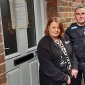 Jane Martin, from Ashfield Council, with officers from Hucknall NPT at the property that has been made secure. Photo: Ashfield Police