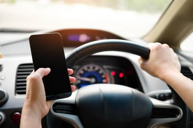 New laws are coming in to tighten up on use of a mobile while at the wheel