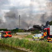 Firefighters, including crews from Hucknall, remain on scene at the huge Ranskill blaze. Photo: NFRS
