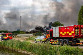 Firefighters, including crews from Hucknall, remain on scene at the huge Ranskill blaze. Photo: NFRS