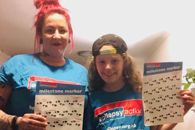 Daniel Gough and his mum Lou have completed a 50-mile walking challenge to support Epilepsy UK