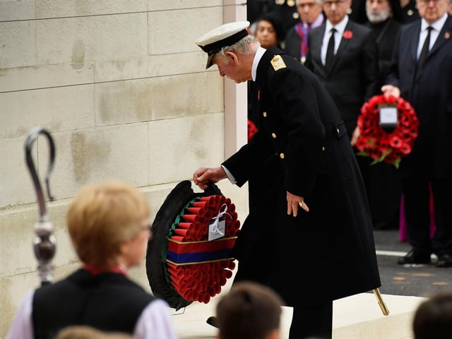 The Prince of Wales lays a wreath during the Remembrance Sunday service at the Cenotaph, in Whitehall, London. The Queen was absent from the ceremony due to her health. Picture date: Sunday November 14, 2021.