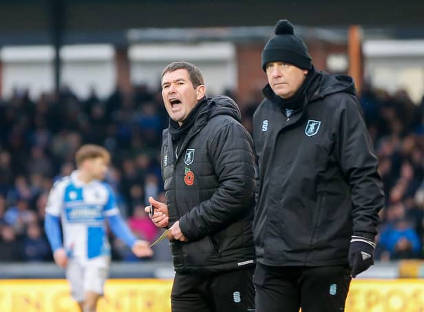 Mansfield Town manager Nigel Clough and first team coach Andy Garner during the match at Bristol Rovers last month.
