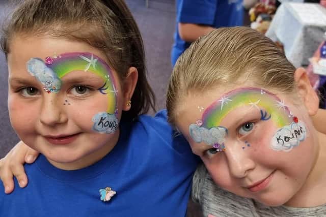 Youngsters remembering Kouper with colourful face painting