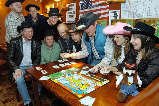 Players from back in the day trying their hand at the cult game Gambler. Photo: Tony Stocks