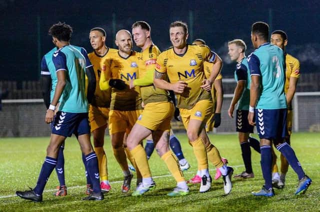 Brad Gascoigne (left centre) celebrates after putting Basford United into a comfortable half-time lead in their win over Rushall Olympic on Tuesday night (CREDIT: CRAIG LAMONT)