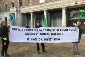 Protestors outside a Nottinghamshire pensions meeting, urging Nottinghamshire Council to divest from fossil fuels.