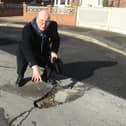 Coun John Wilmott was left stunned when resurfacing work on Coronation Road in Hucknall did not include fixing a huge pothole