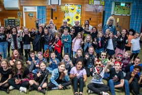 Staff and pupils at Linby cum Papplewick School all dressed as rock stars for their drumming masterclass with Status Quo legend Jeff Rich. Photo: Lou Brimble