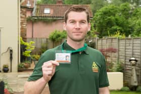 An OFTEC technician with his ID card.