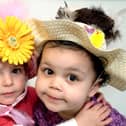 2006:  Holly Farbrother and Ebony McCarthy enjoy their Easter Bonnet  parade at The Hucknall Day Nursery.