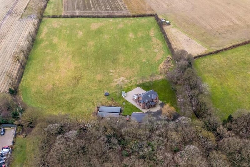 This overhead drone shot underlines the extent of the gardens and land that make up the nine-acre plot.