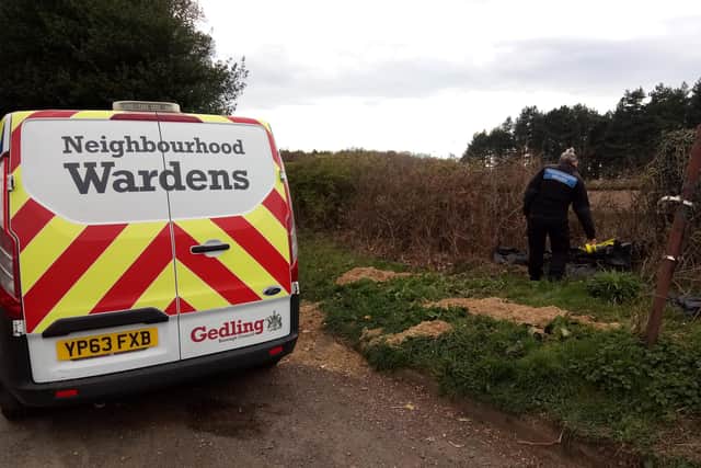Neighbourhood wardens at the fly tip where the asbestos was discovered. Photo: Gedling Borough Council