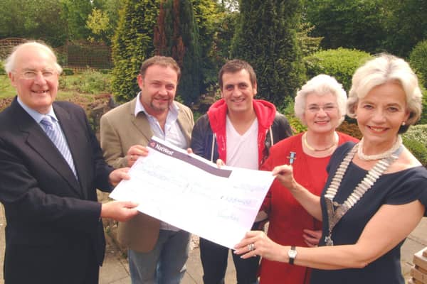 Yvonne Neville, right, District Chairman of the Inner Wheel Notts and Derbyshire and Judith Turner, second right, Council Member of The Inner Wheel present a cheque for £735 to the John Eastwood Hospice on Thursday. Actor Chris Gascoigne, centre and John Thompson, second left, receive the cheque on behalf of the Hospice with Trustee Ted Aspley, left.