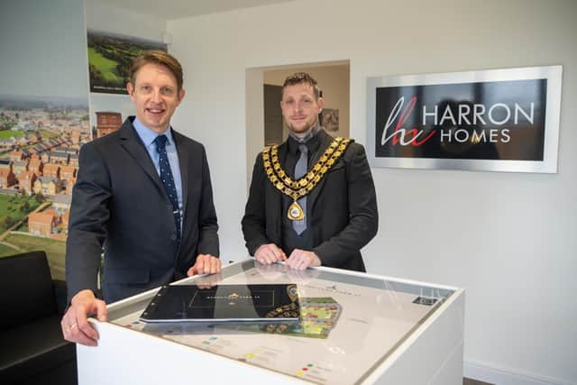Coun Dale Grounds with Paul Walters of Harron Homes at the launch of phase IV of the Sandlands Park development in Hucknall. Photo: Harron Homes