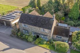 An aerial view of the majestic property on Mansfield Road at Heath, near Chesterfield. It boasts four bedrooms, two bathrooms and five reception rooms.