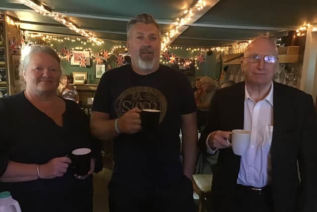 Pictured at the latest Byron's Rest coffee morning are Jan Lees from the Hope Lees project, Richard Darrington, owner of the Byron's Rest and Coun John Wilmott