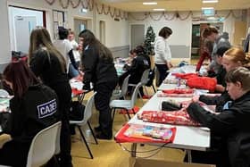 Bulwell police cadets helped wrapped presents for Bags of Blessings to hand to deprived children. Photo: Nottinghamshire Police