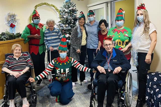 Staff and residents at Hall Park Care Home took part in Elf Day
