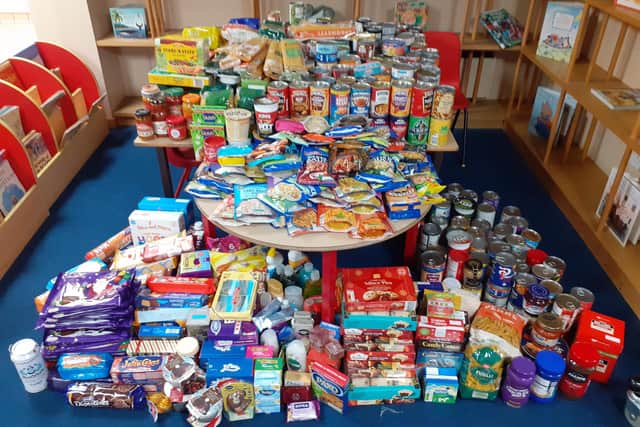 Pupils at Butler's Hill Infant School in Hucknall have collected a huge number of items for the firefighters' 12 Days of Christmas food bank appeal