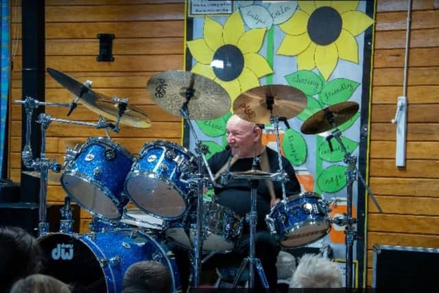 Jeff wowed the pupils with his skills on a regular rock drum kit. Photo: Lou Brimble