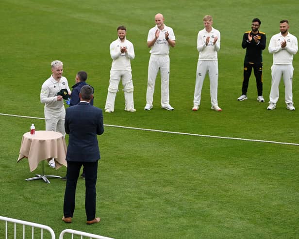 Tom Moores receives his county cap ahead of the LV= Insurance County Championship match between Nottinghamshire and Worcestershire. (Photo by Gareth Copley/Getty Images)