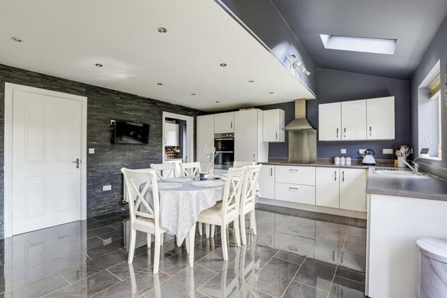 Next stop has to be the contemporary kitchen diner which, in many respects, is the heart of the Hucknall home. It has a range of fitted base and wall units, and there is plenty of space on the tiled floor for a dining table.