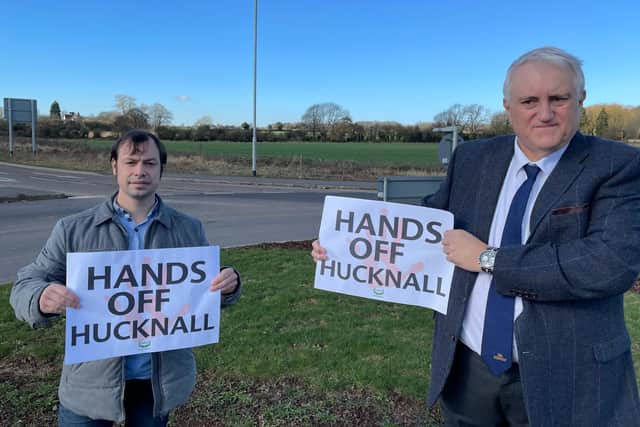 Hucknall councillors Lee Waters (left) and David Shaw show their opposition to the 'super council' plans