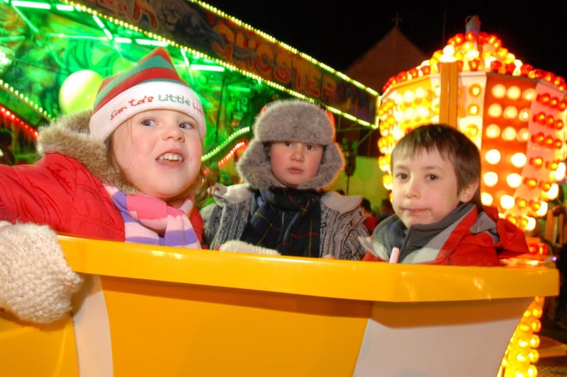 2011: This trio are having all the fun at the fair, taken at Hucknall’s Christmas lights switch-on.