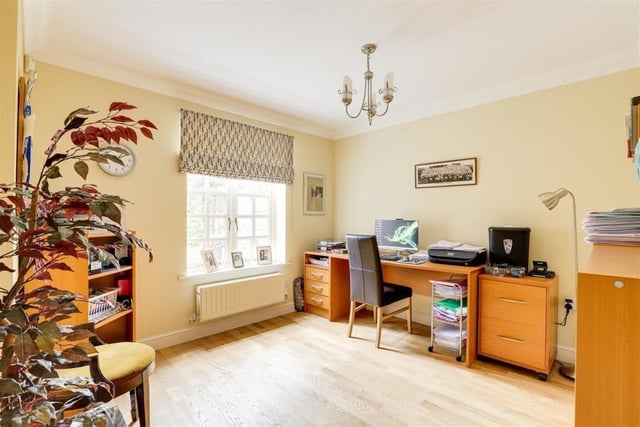 Few would regard working as a chore if it was within this pleasant study. It faces the front of the house and includes engineered wood flooring and coving to the ceiling.