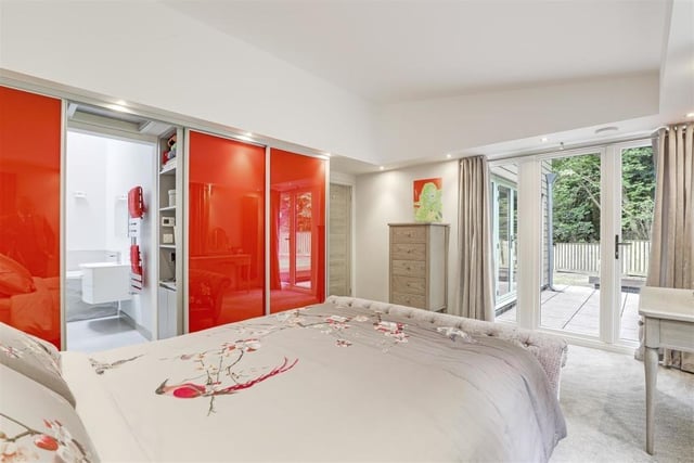 The master bedroom is an impressive sight, especially as uPVC French doors open out on to the rear patio area. It also features a carpeted floor, recessed spotlights, fitted, floor-to-ceiling wardrobes and two vertical radiators.