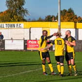 Hucknall's players celebrate a goal against St Andrews. Pic: Lee Fox.