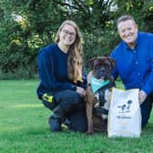Emma Slawinski, director of policy, prevention and campaigns at the RSPCA and Neil McAdam, founder of McAdams Pet Food with Mastiff Crossbreed Bonnie who’s been waiting for her forever home for six months.
