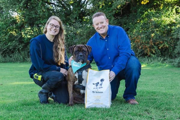 Emma Slawinski, director of policy, prevention and campaigns at the RSPCA and Neil McAdam, founder of McAdams Pet Food with Mastiff Crossbreed Bonnie who’s been waiting for her forever home for six months.
