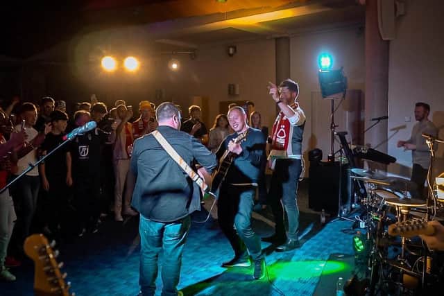 Forest boss Steve Cooper joined the band on stage to play the Oasis hit Wonderwall at the evening party back in Nottingham