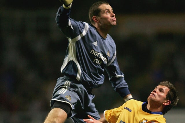 Shay Given the Newcastle goalkeeper clears from Adam Birchall of Mansfield.