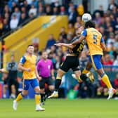 Mansfield Town debutant defender Richard Narty heads clear - Pic Chris Holloway