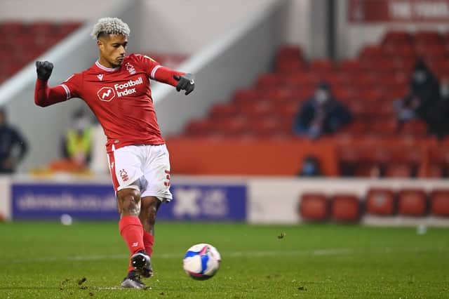 Lyle Taylor slots home a penalty in the 97th minute as Forest beat Coventry City 2-1. (Photo by Laurence Griffiths/Getty Images)