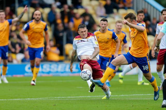 Mansfield Town's Rhys Oates breaks clear against Bradford City, Photo: Chris Holloway.