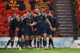 Mansfield Town celebrate one of George Lapslie's goals in Saturday's 3-2 win at Doncaster Rovers. Photo by Chris Holloway/The Bigger Picture.media